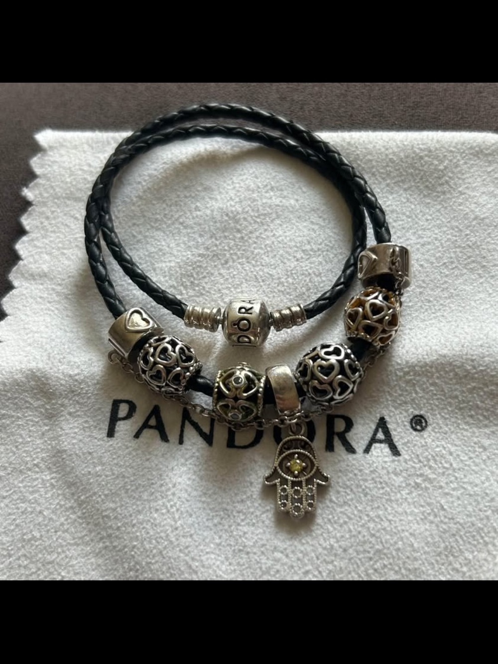 Pandora leather bracelet with charms